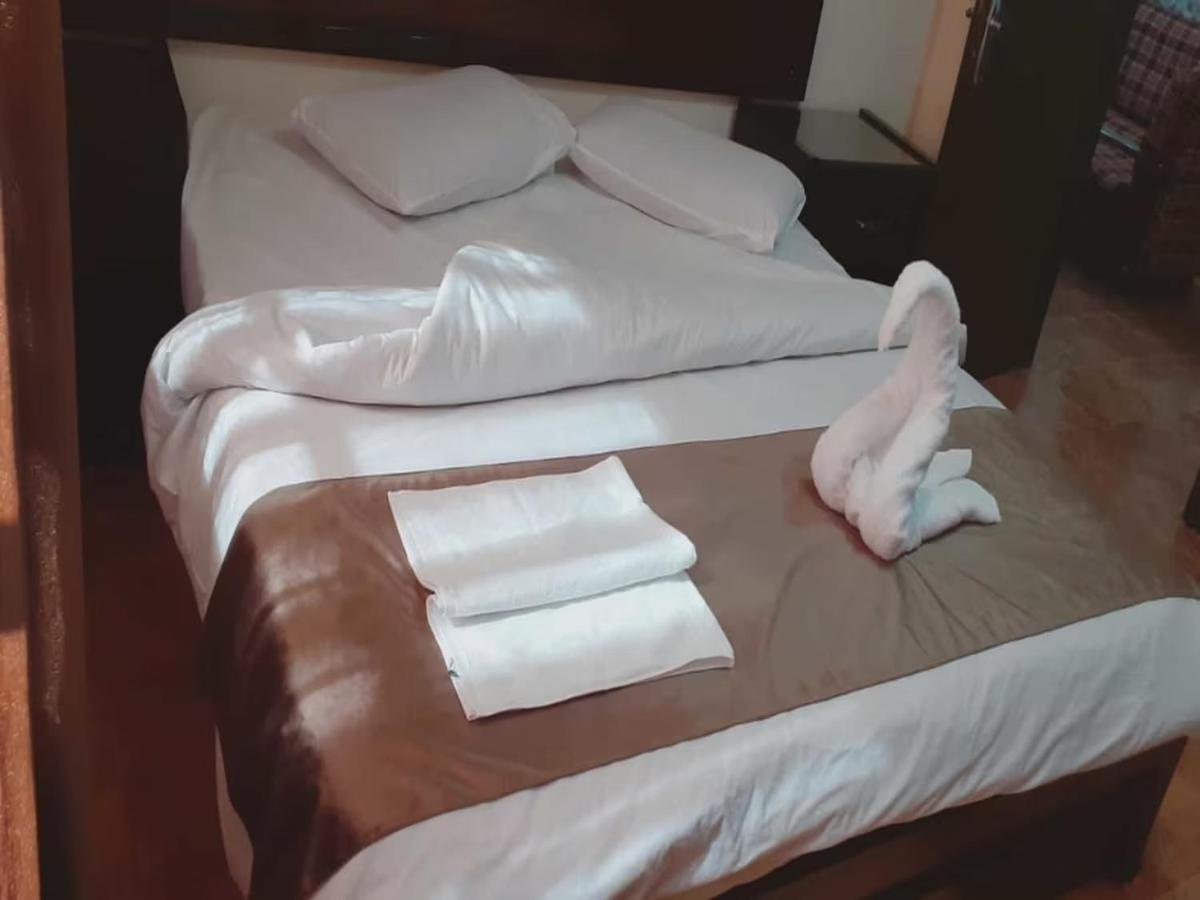Al-Nujoom Hotel Suites Amman Exteriör bild