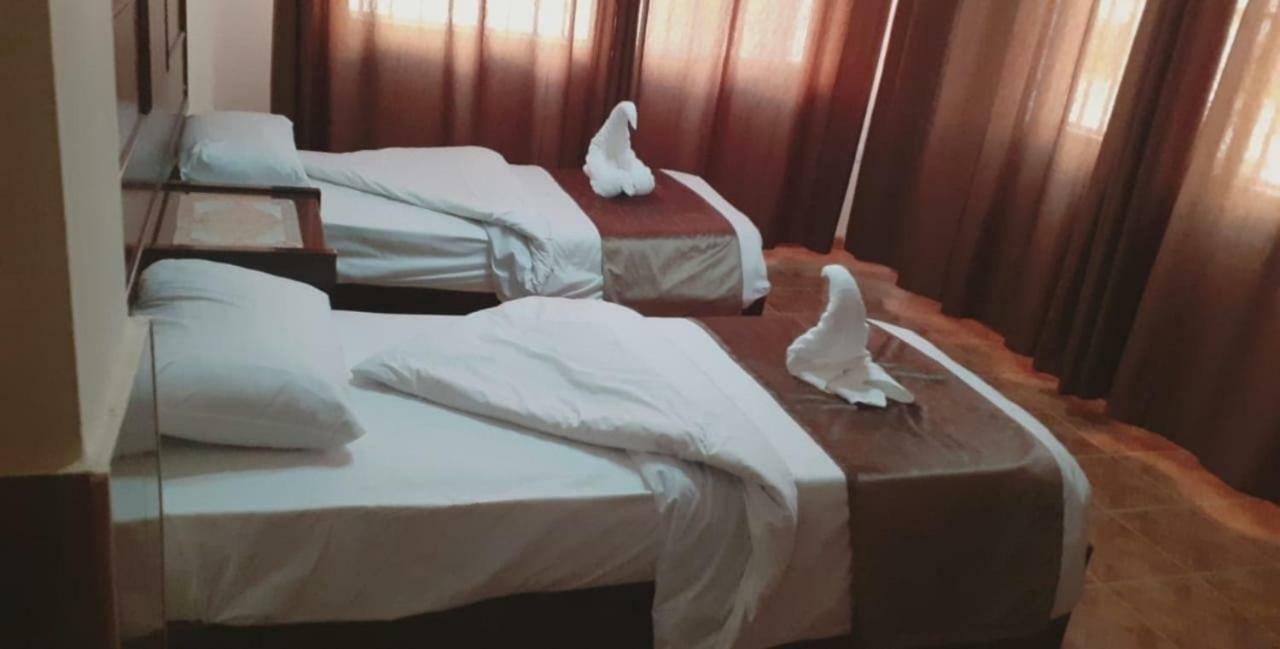Al-Nujoom Hotel Suites Amman Exteriör bild